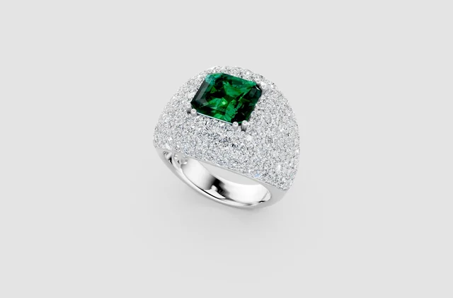 Rendering di anello bombato con pavé e pietra centrale verde