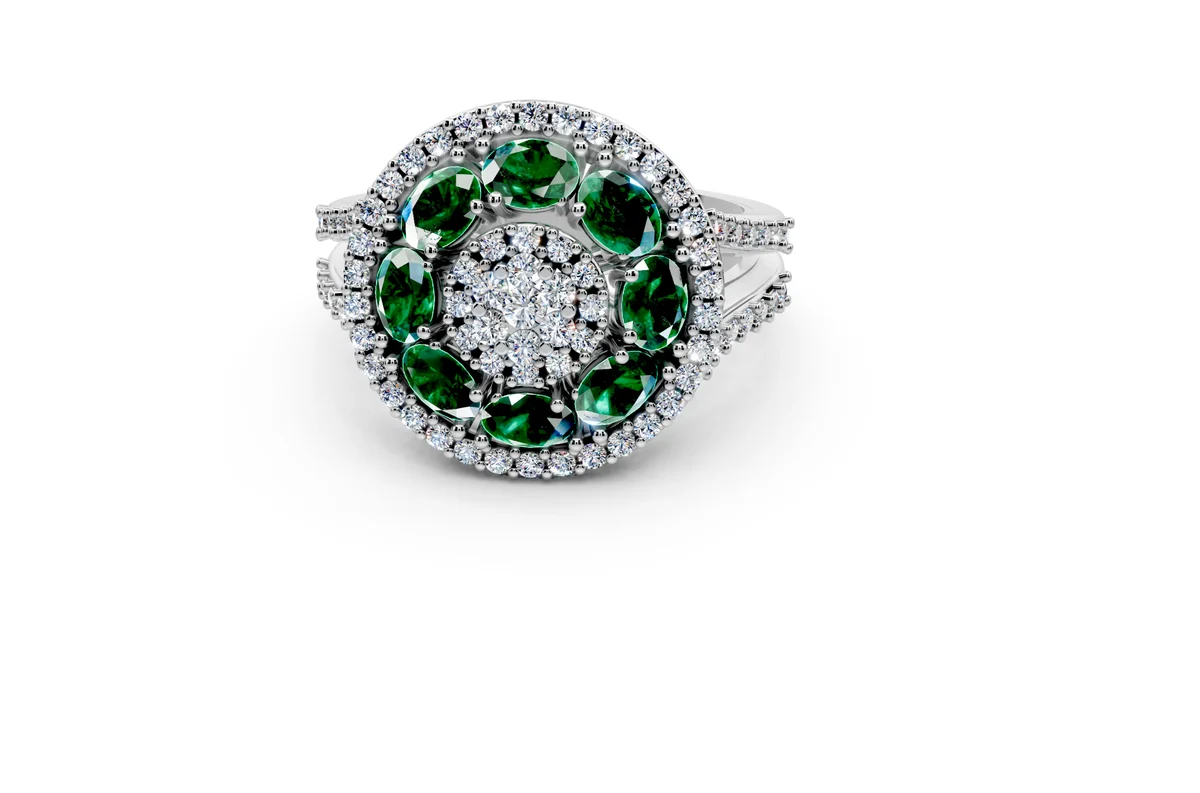 Rendering di anello con pietre verdi e pavé